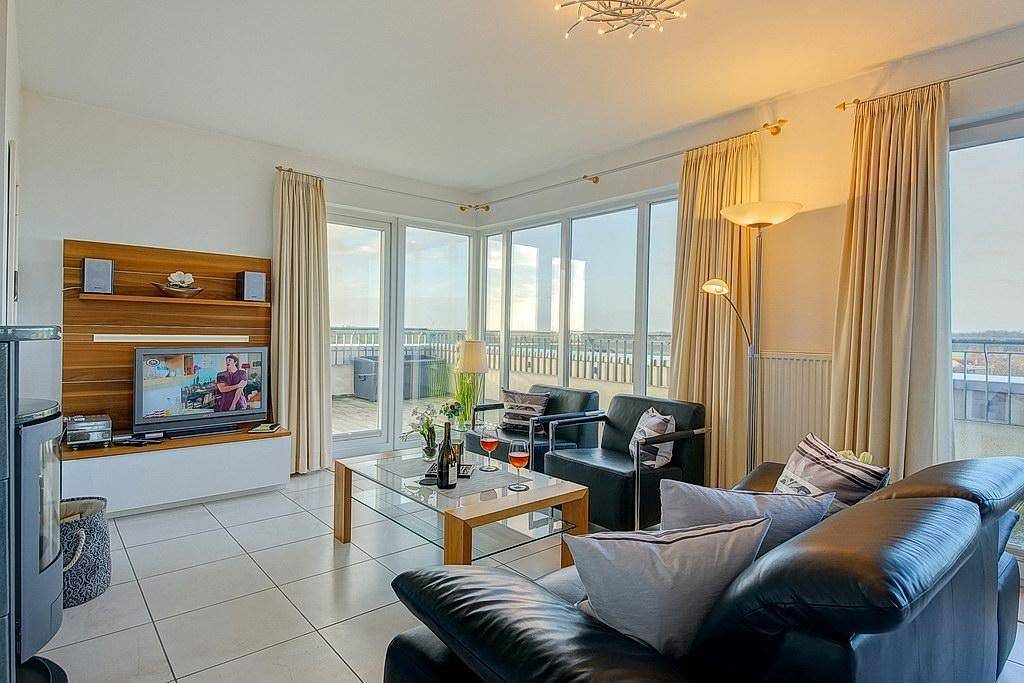 Exklusives Penthouse mit großer Dachterrasse, Meerblick, Sauna, Hot-Tub & Kamin!