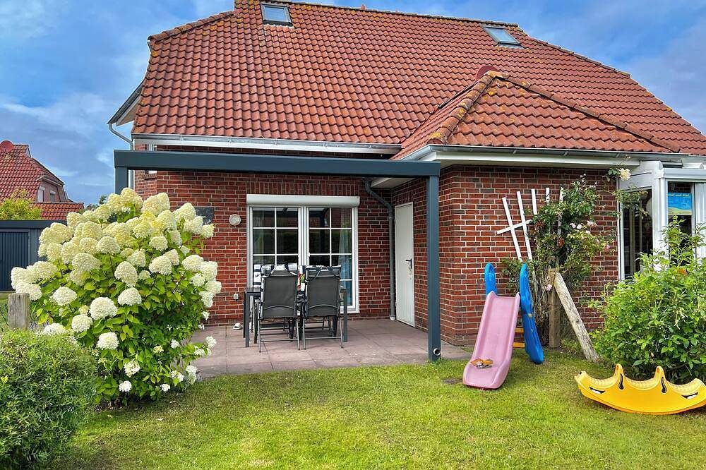 Familienfreundliches Ferienhaus in Deichnähe, Terrasse und Garten
