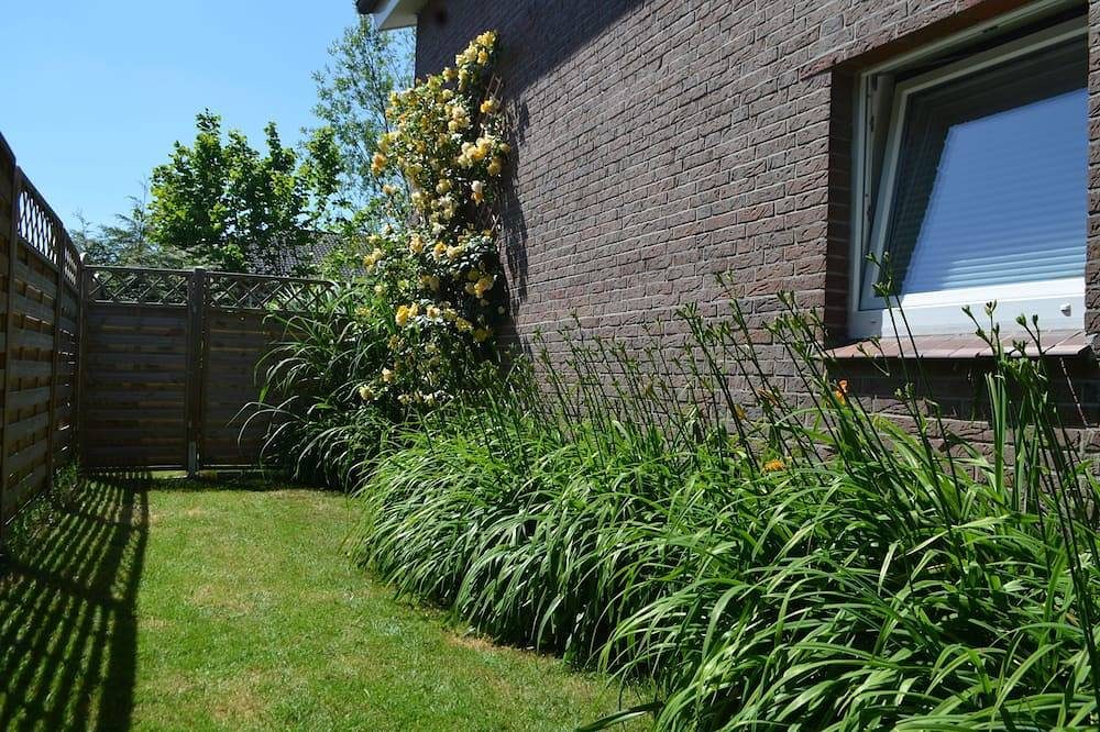 Modern eingerichtete, ebenerdige Wohnung mit Garten, ideal für junge Familien. — Bild 5