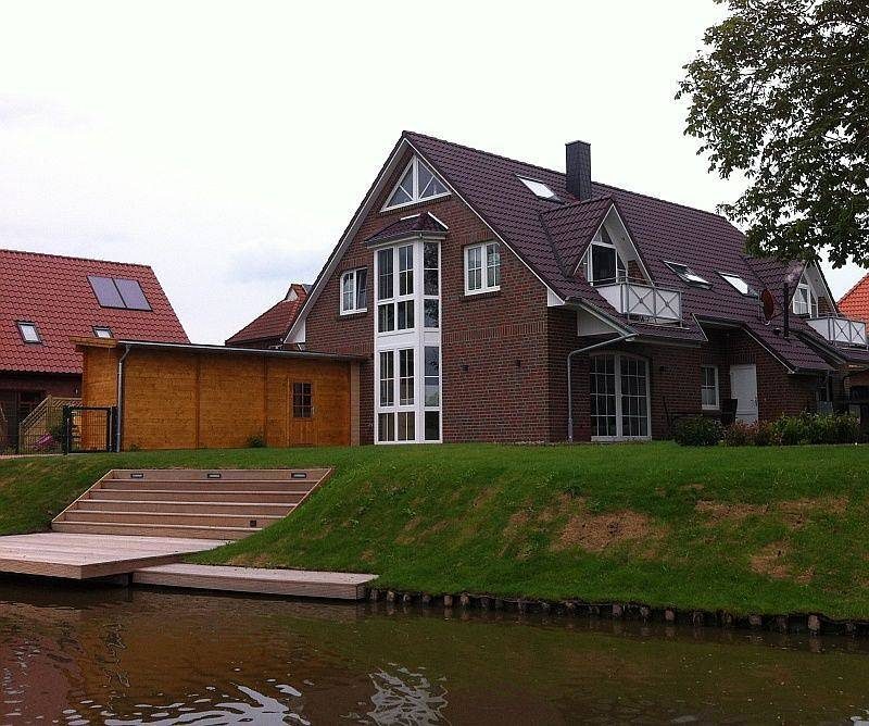Ferienwohnung (80qm) mit Balkon, Kamin und Badewanne für 4 Personen am Wasser