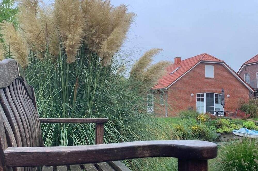 Schöne helle Ferienwohnung Silbermöwe Og direkt an den Greetsieler Grachten — Bild 3