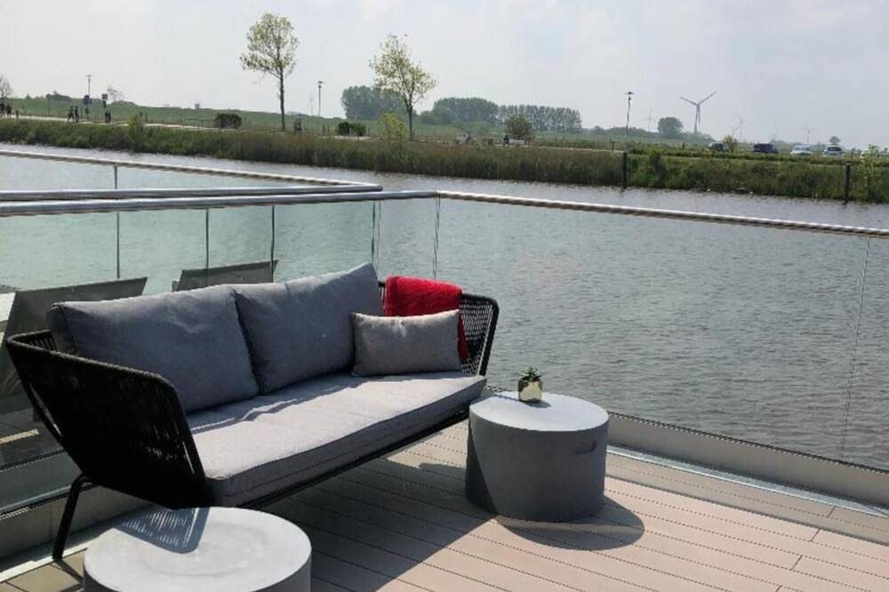 Pfahlhaus Perle am Yachthafen Carolinensiel Harlesiel ??, Wohnen auf dem Wasser — Bild 2