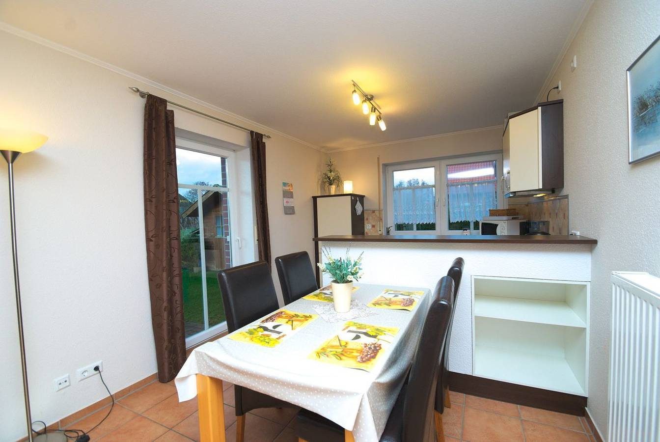 Strandnahe Ferienwohnung für 4 Personen in Norddeich mit Deichblick und Garten — Bild 2