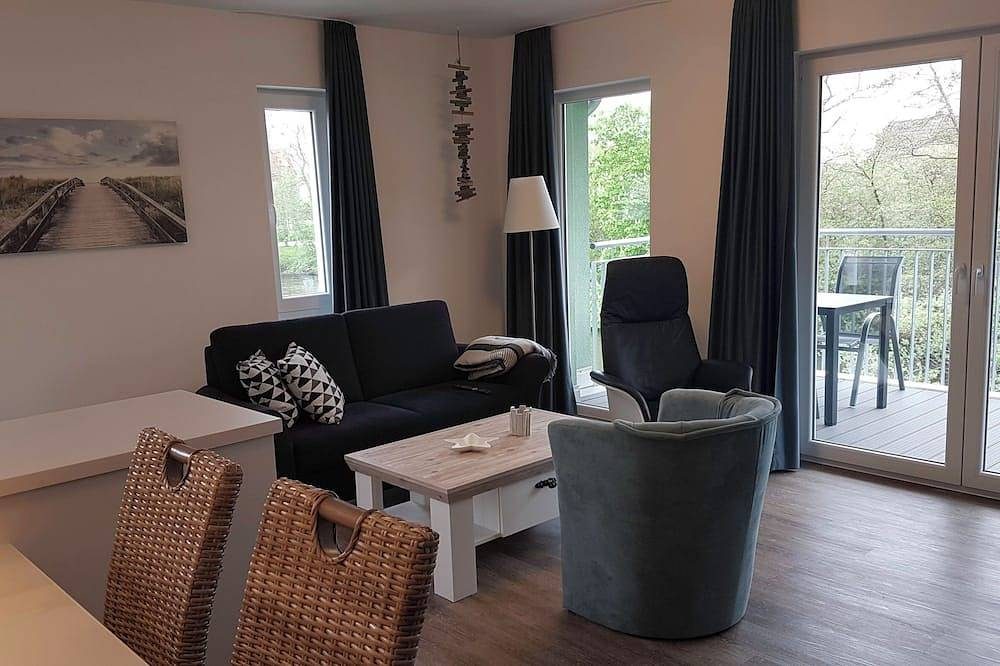 Apartment mit 2 Schlafzimmern, offener Küche, Wohnbereich und Wellnessbad.