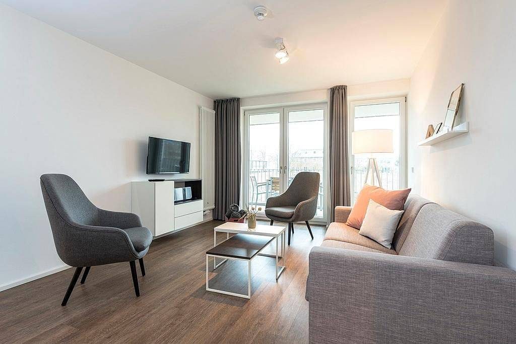 Top Ferienapartment in Strandnähe mit toller Loggia, zwei Bädern & Sauna im Haus