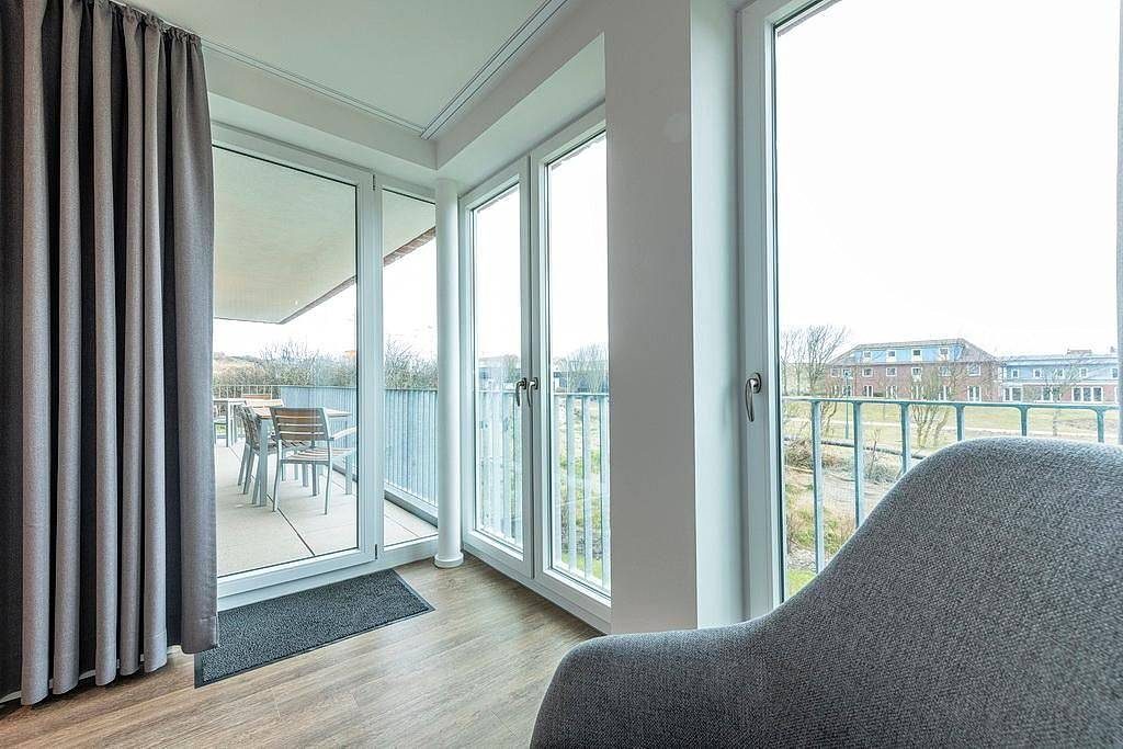 Top Ferienapartment in Strandnähe mit toller Loggia, zwei Bädern & Sauna im Haus — Bild 5
