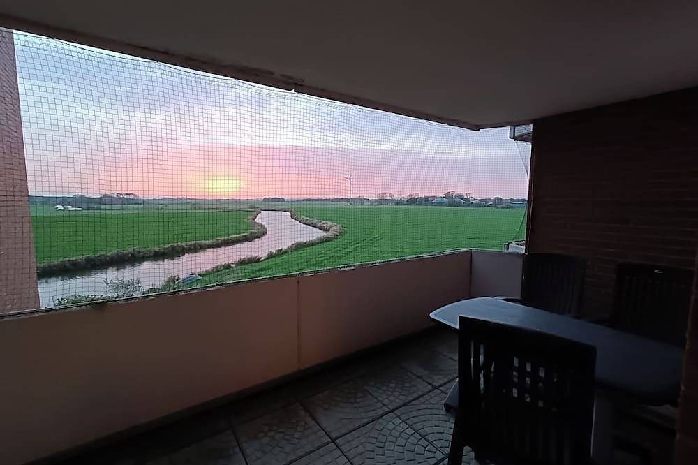 Ferienwohnung mit weiter Sicht auf wunderschöne Sonnenuntergänge (3.Og) — Bild 3