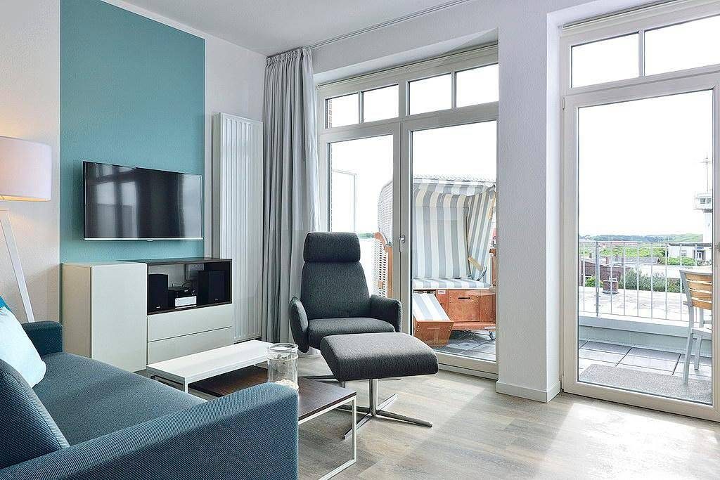 Schickes Apartment an der See mit Westbalkon, Meerblick und eigenem Strandkorb!