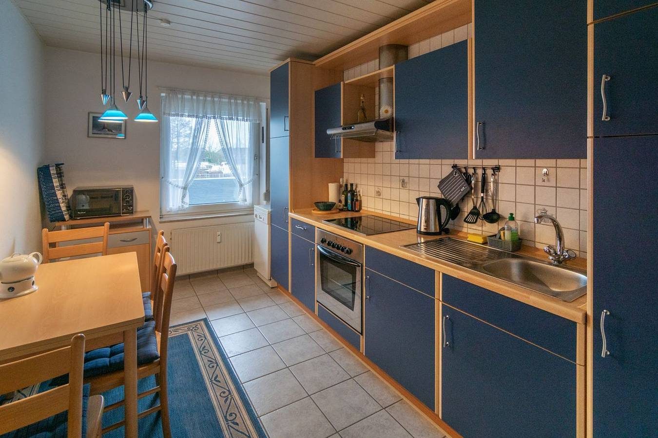 Oberwohnung Strandflieder mit Balkon direkt am Kanal — Bild 3