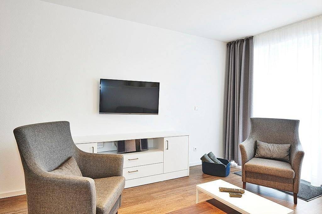 Strandnahes, modernes Apartment mit Westbalkon inkl. Schwimmbad- & Saunanutzung — Bild 3