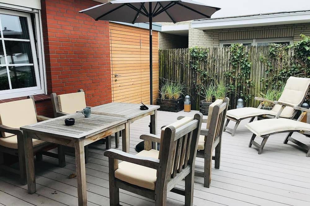 Bogenhuus unten mit Terrasse im Zentrum von Norderney — Bild 2