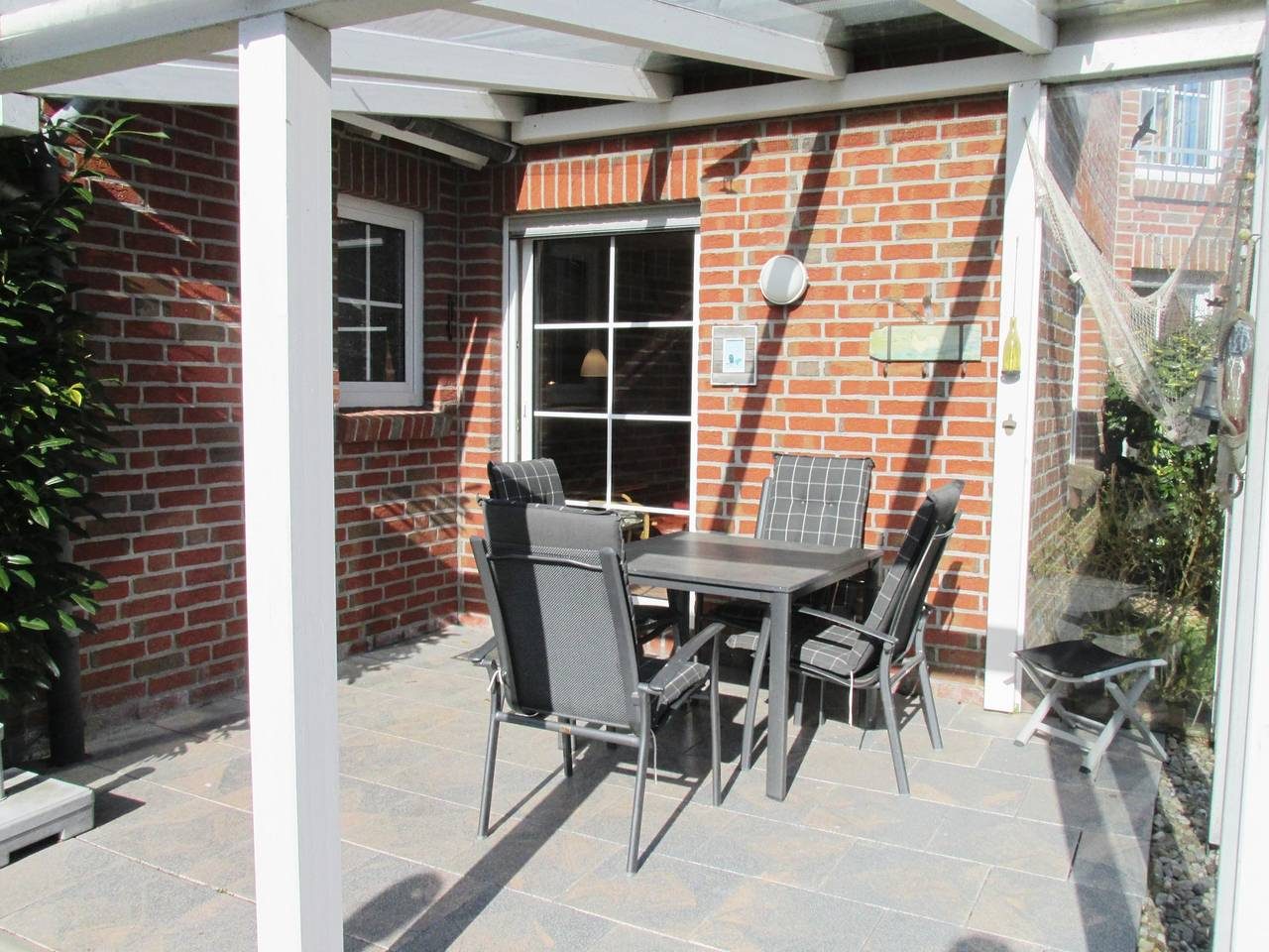 Doppelhaushälfte mit windgeschützter Terrasse — Bild 2