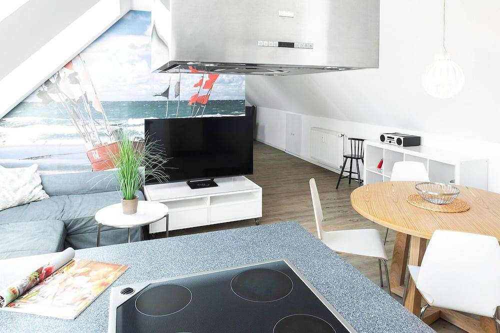 Familien- und hundefreundliche Ferienwohnung mit Blick auf Hafen und Wattmeer. — Bild 2