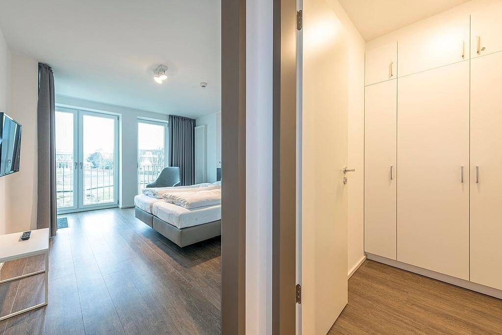 Top Ferienapartment in Strandnähe mit toller Loggia, zwei Bädern & Sauna im Haus — Bild 4