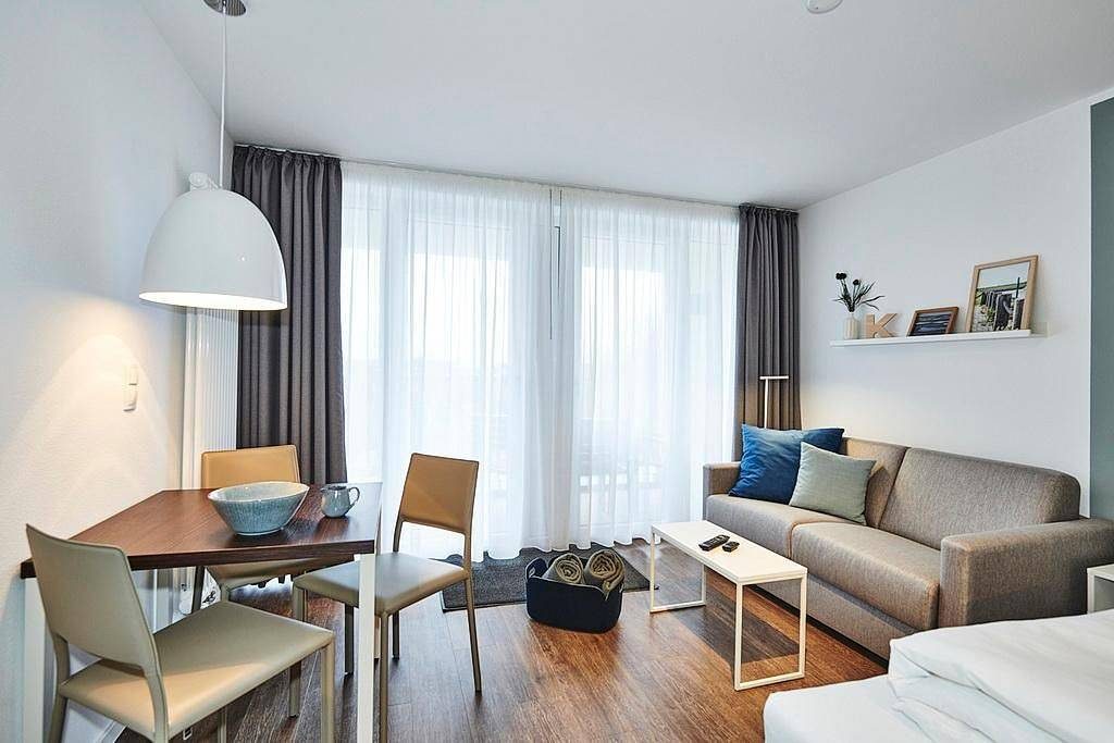 1-Zimmer Apartment in Strandnähe mit Balkon und inkl. Schwimmbad- & Saunanutzung — Bild 3