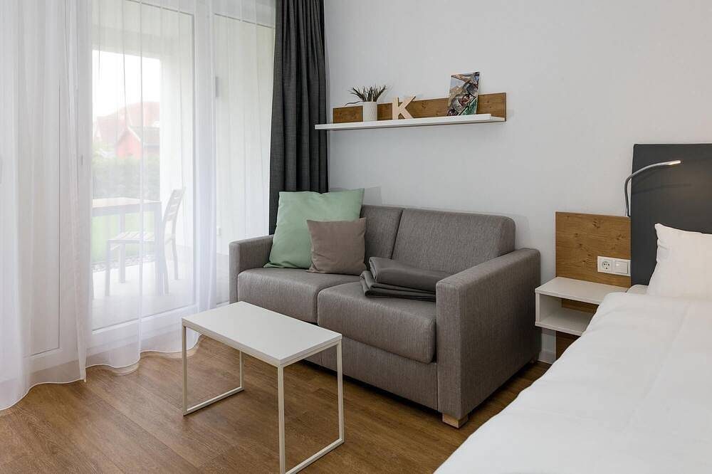 Strandnahes Apartment mit Terrasse inkl. Parkplatz, Schwimmbad- & Saunanutzung