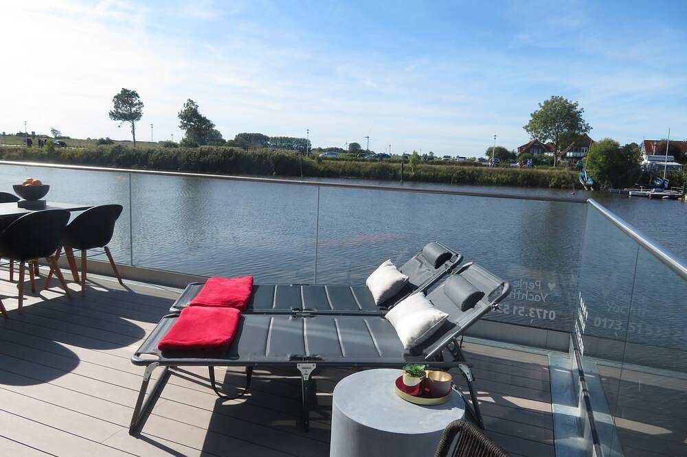Pfahlhaus Perle am Yachthafen Carolinensiel Harlesiel ??, Wohnen auf dem Wasser — Bild 3
