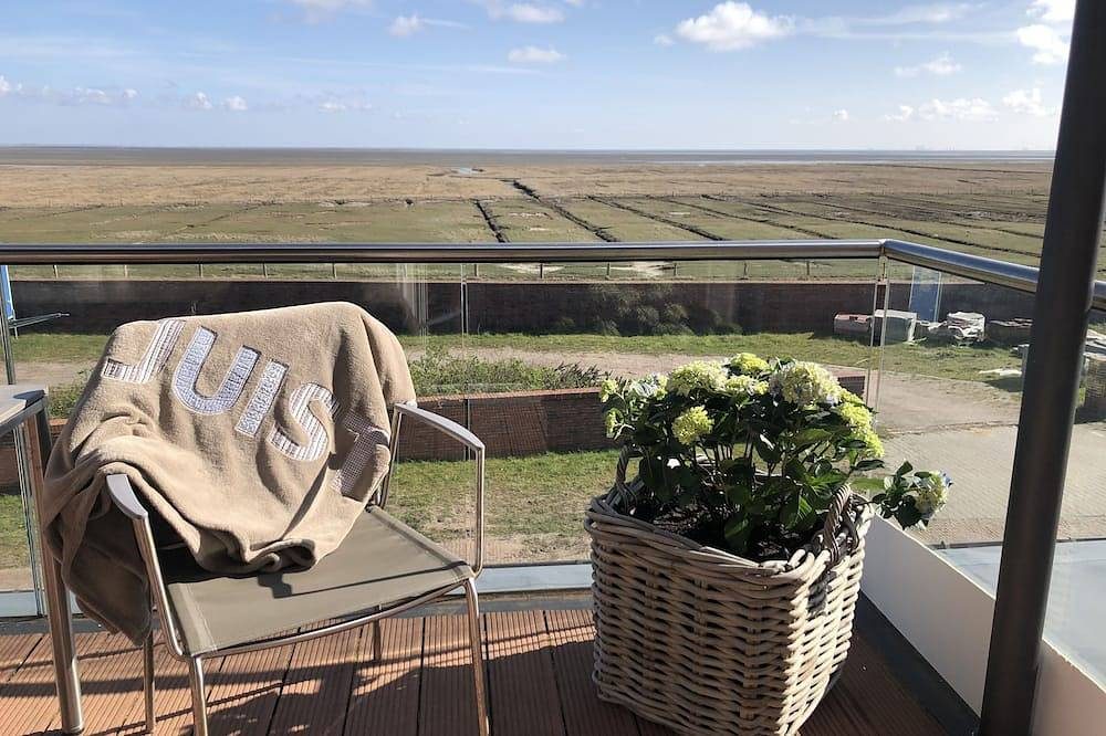 Komfort-Ferienwohnung mit Südbalkon und einzigartigem Wattblick