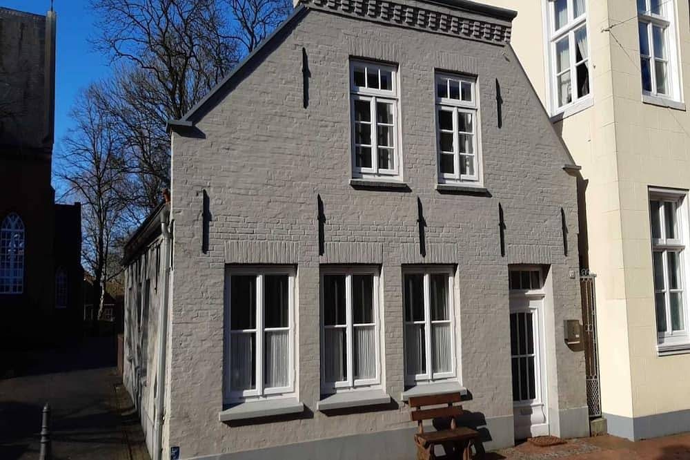 Ferienwohnung am Kirchplatz 25561 - Ferienwohnung am Kirchplatz
