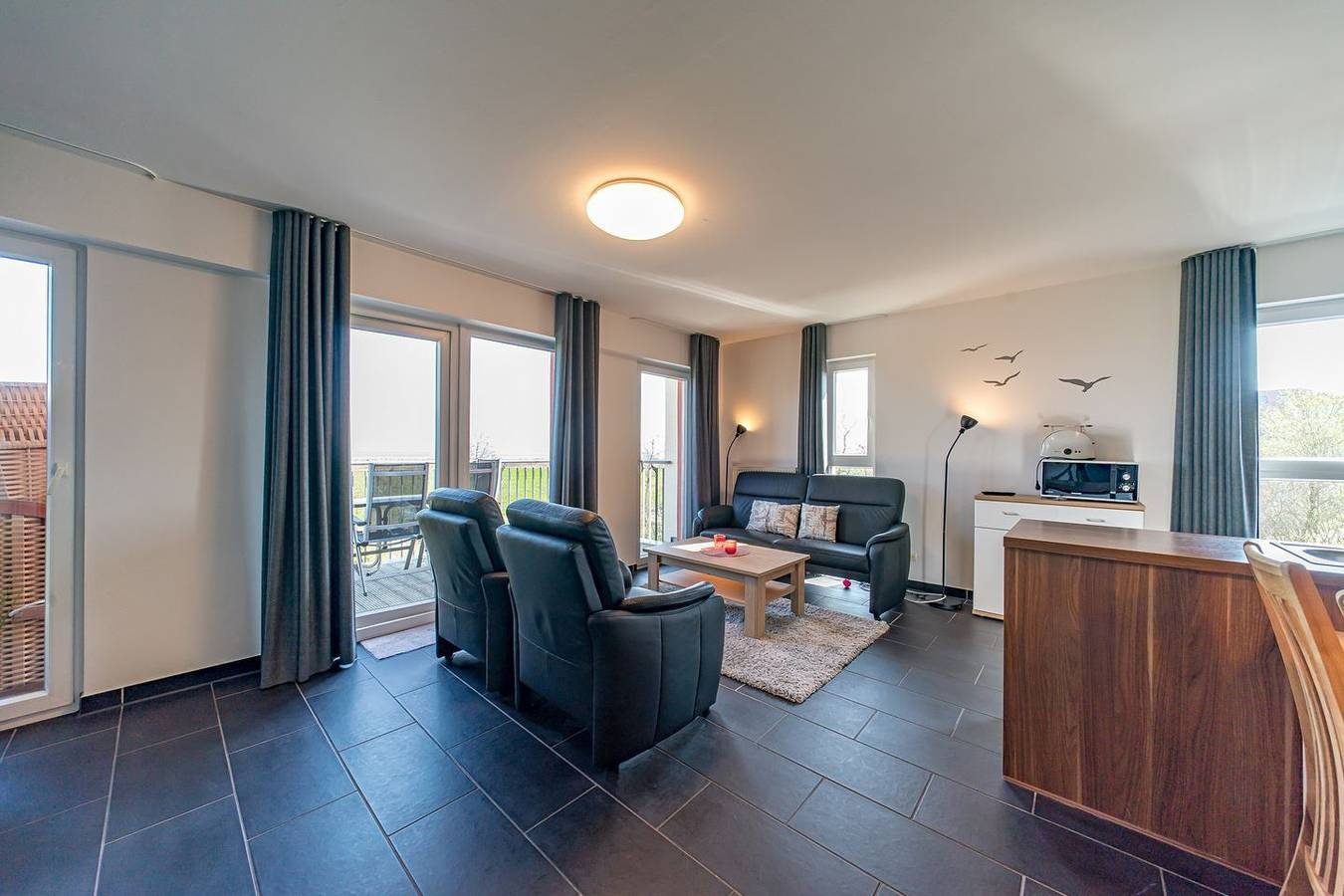 Exklusives Ferienapartment mit Meerblick, Balkon, Sauna und Whirlbadewanne — Bild 4