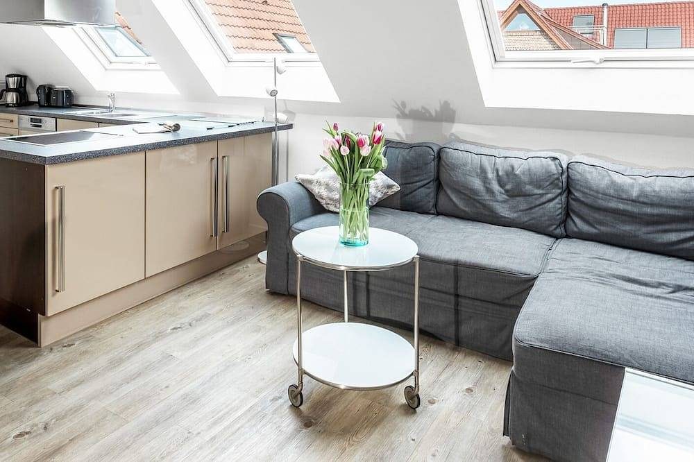 Familien- und hundefreundliche Ferienwohnung mit Blick auf Hafen und Wattmeer.