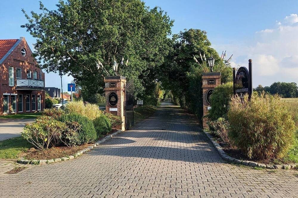 Familienfreundliche Erdgeschosswohnung mit großzügigem Garten und Wasserzugang — Bild 3