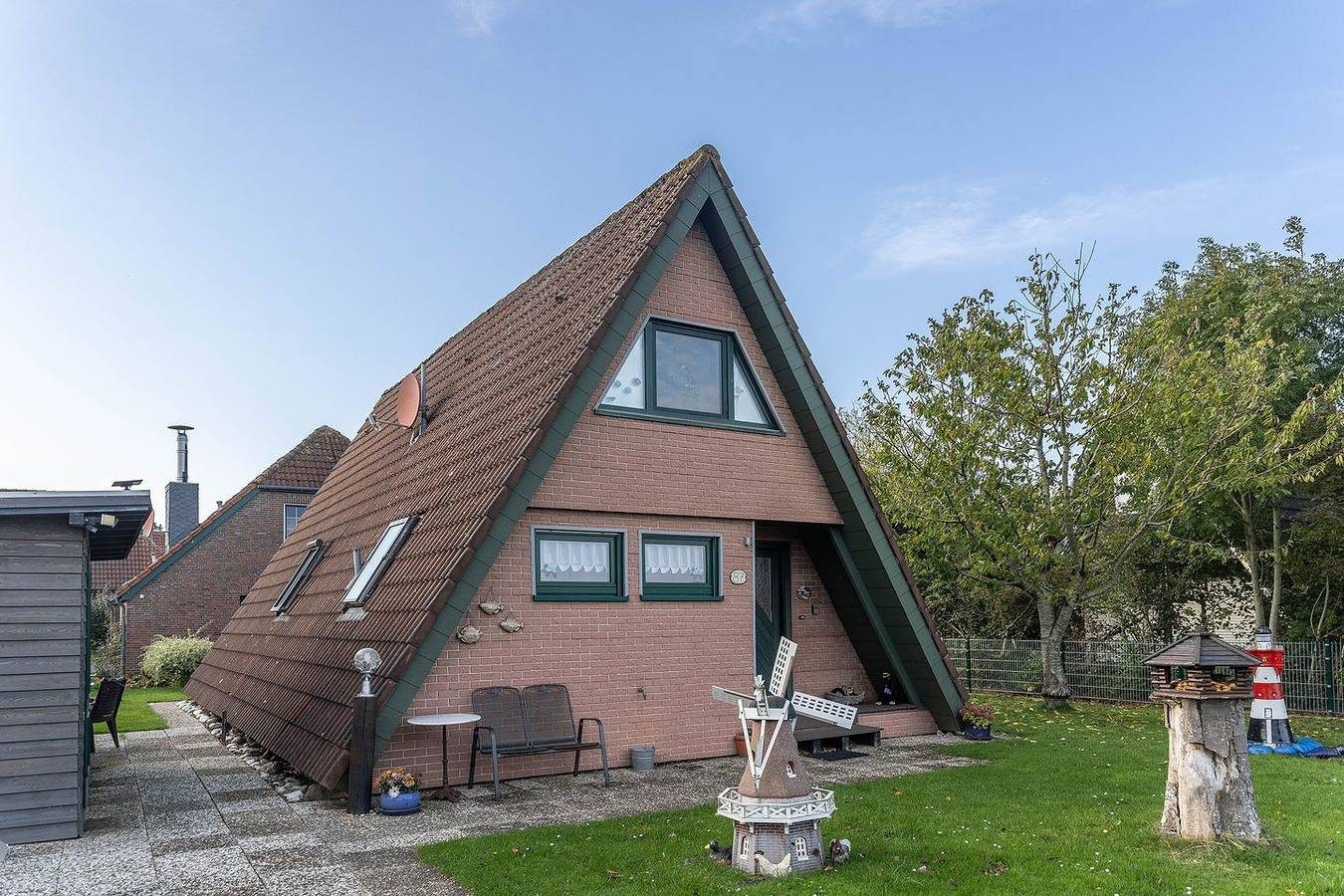 Nurdach- Ferienhaus mit 3 Schlafzimmern in Carolinensiel ( 72m²) für 6-7 Personen