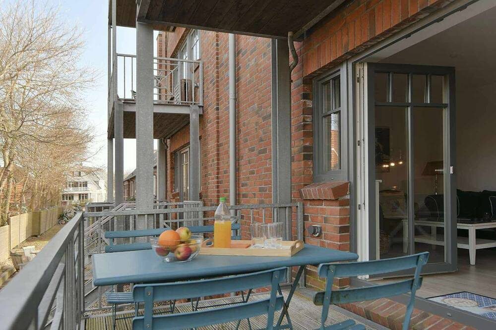 Moderne Ferienwohnung mit großem Balkon und stilvoller Ausstattung — Bild 2