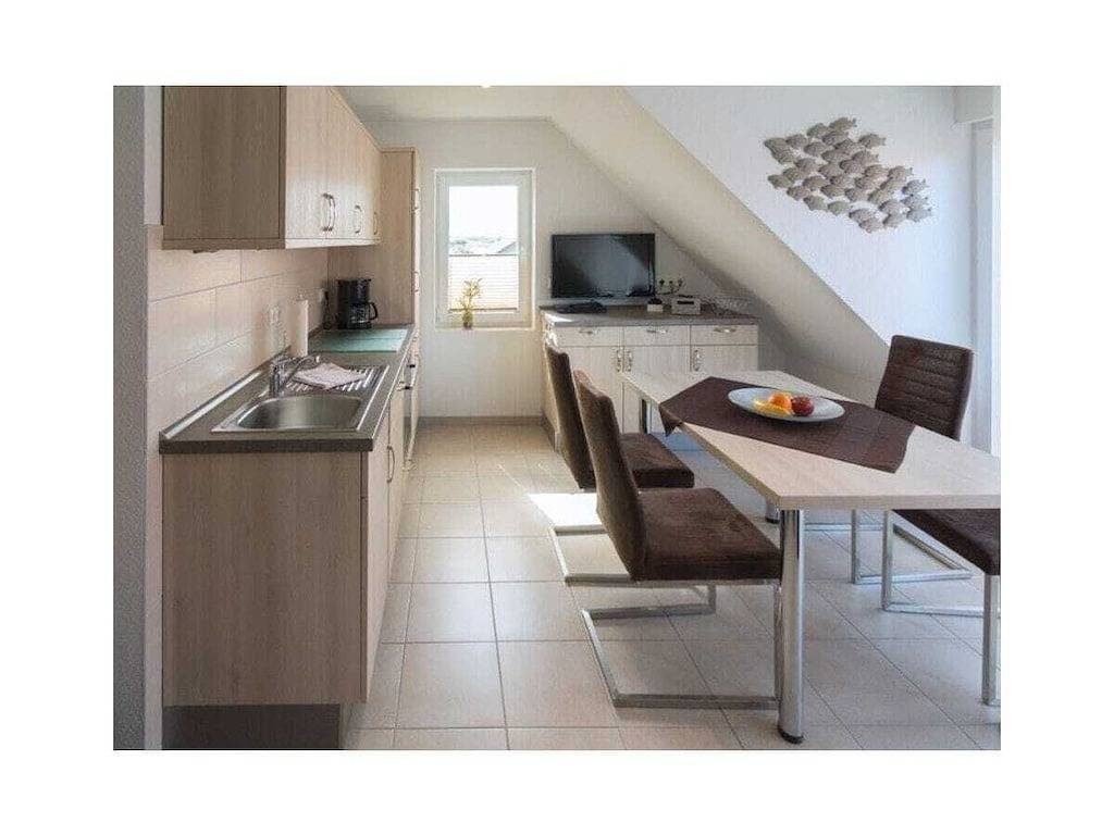 Nordsee-Urlaub in Norden: Ferienwohnung Strandlilie in No...