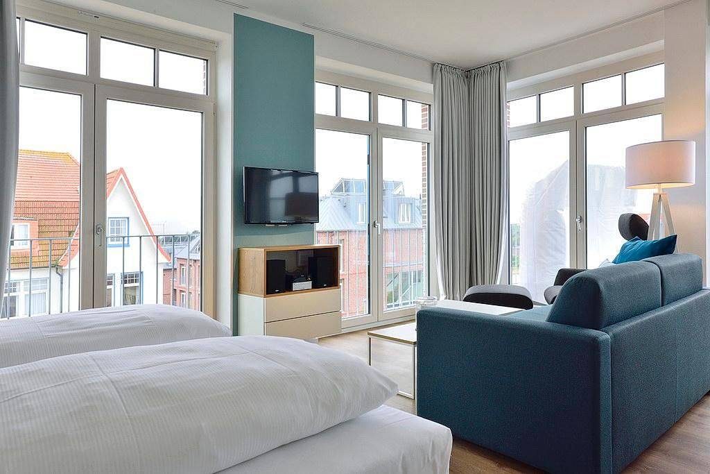 Modernes Apartment am Meer mit Westbalkon, Meerblick und Saunabereich im Haus! — Bild 2