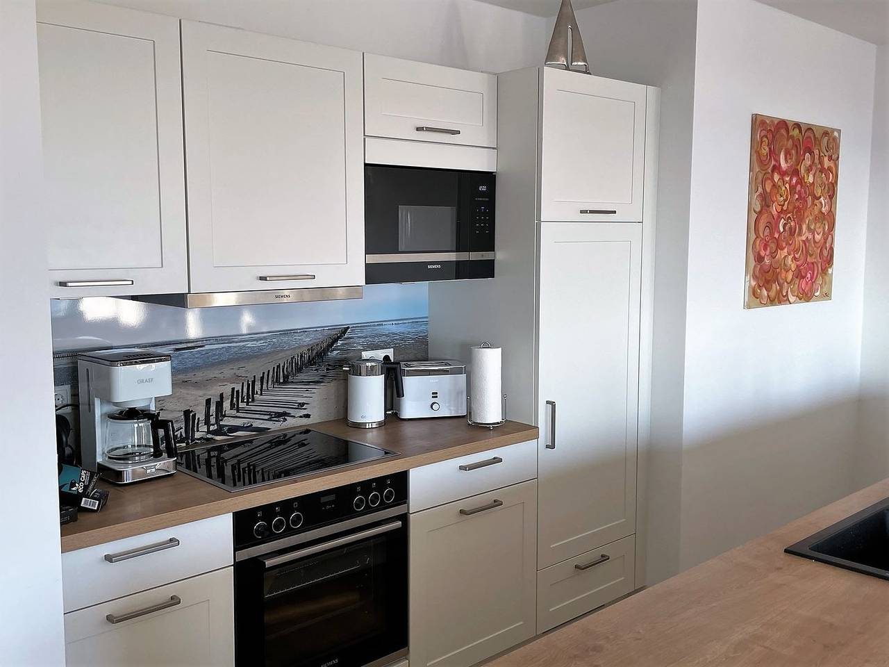 Moderne, hochwertige Ferienwohnung, Sauna, großer Balkon, Meerblick, Strandnah — Bild 2