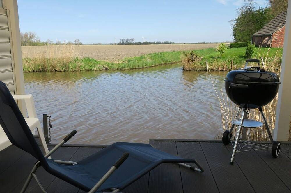 Haus am Kanal Nähe Greetsiel, Ruderboot\nangeln direkt vom Steg, Haustier erlaubt — Bild 4