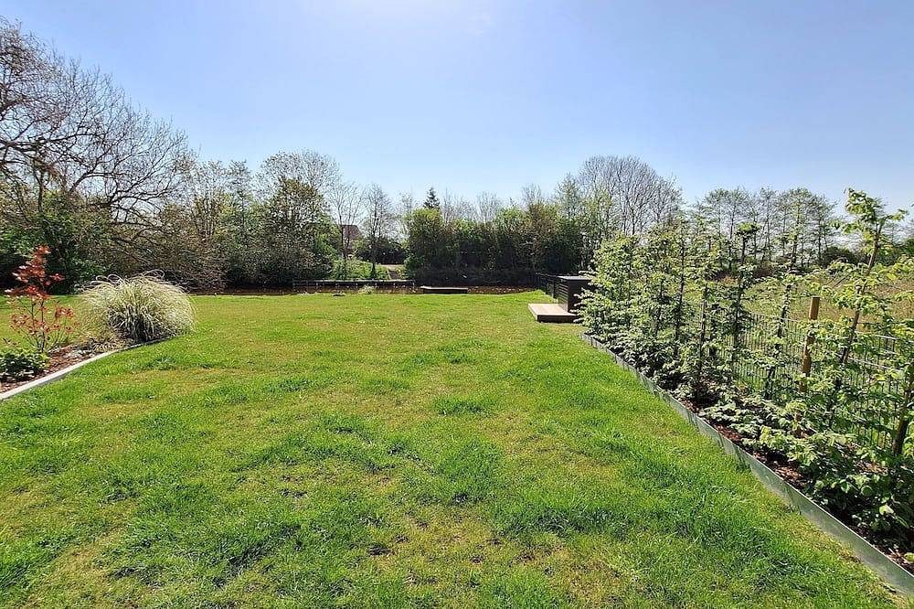 Familienfreundliche Erdgeschosswohnung mit großzügigem Garten und Wasserzugang — Bild 5