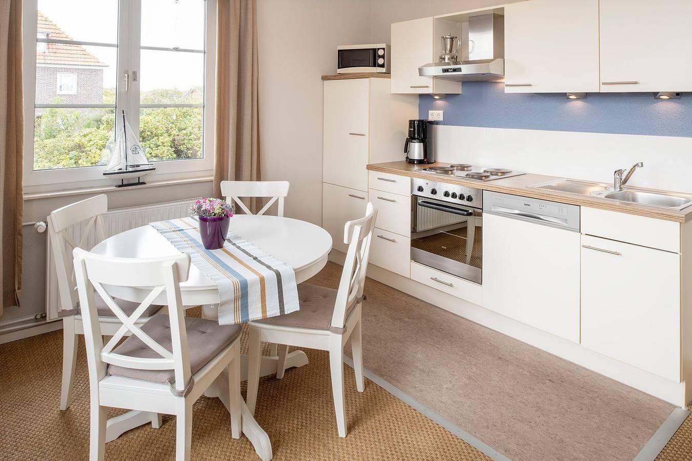 Helle Ferienwohnung auf Langeoog mit Gartennutzung für bis zu vier Personen — Bild 3