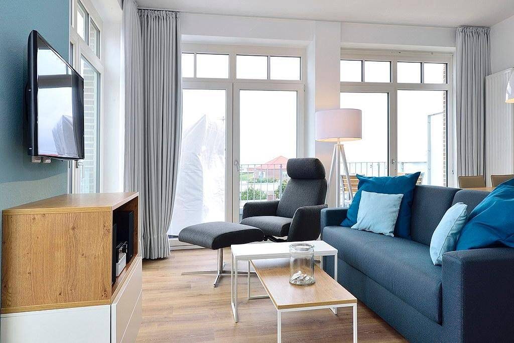 Modernes Apartment am Meer mit Westbalkon, Meerblick und Saunabereich im Haus!