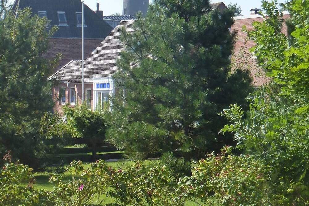 zentrale Lage, Blick auf Alten Leuchtturm, wenige Minuten zu Strand u. Zentrum — Bild 4