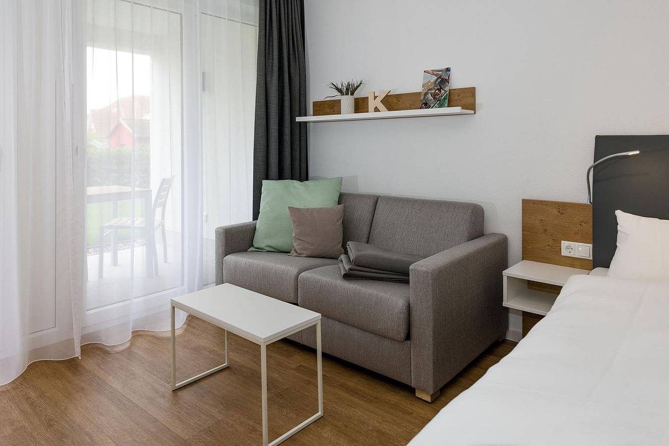 Strandnahes Apartment mit Terrasse inkl. Parkplatz, Schwimmbad- & Saunanutzung