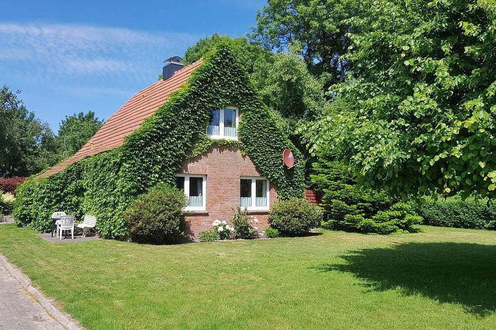 Ferienwohnung direkt an der Nordsee mit großem Garten und überdachte Terrasse