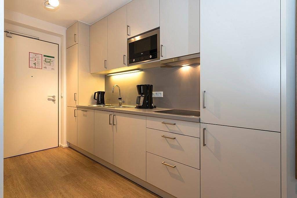 Zentrales Apartment mit sonniger Terrasse, Sauna im Haus - nur 300 m zum Strand! — Bild 4