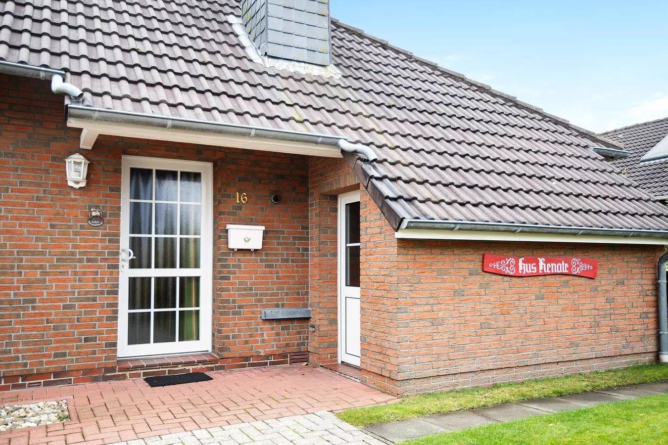Bungalow in Neßmersiel lädt mit seiner Terrasse und weiteren Annehmlichkeiten zum erholsamen Urlaub ein.