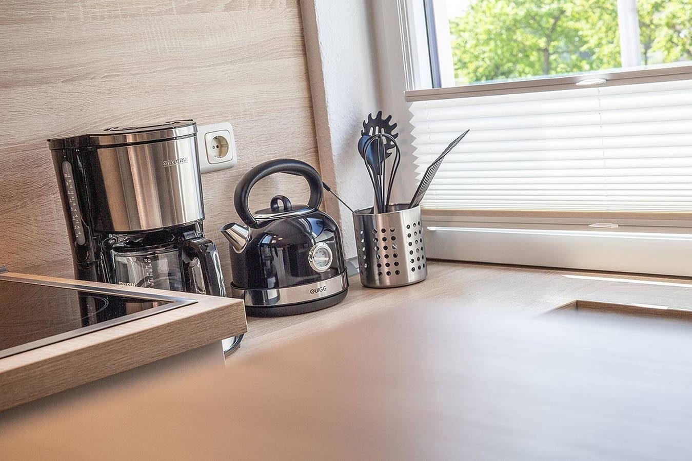 Lauschigkeit pur: Die freundliche Og-Wohnung (mit separatem Eingang) wurde 2021 neu renoviert. — Bild 5