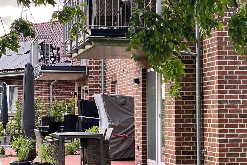 Neue Eg-Ferienwohnung direkt an der Greetsieler Gracht mit Wasserzugang — Bild 5