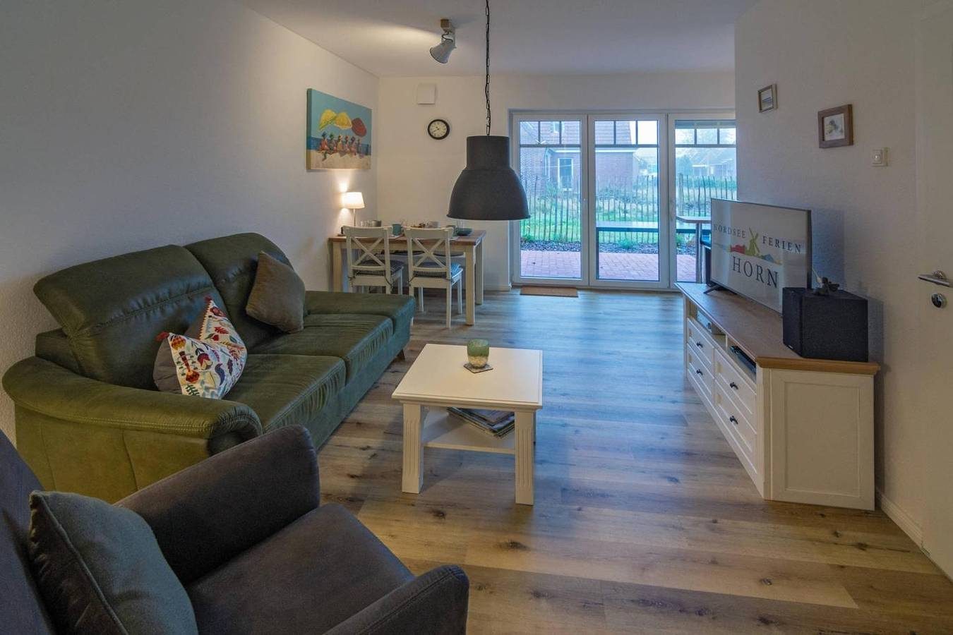 Moderne Erdgeschoßwohnung Südwester in zentraler Lage — Bild 2