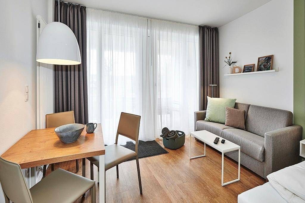 Strandnahes Ferienapartment mit Terrasse inkl. freier Schwimmbad- & Saunanutzung — Bild 4