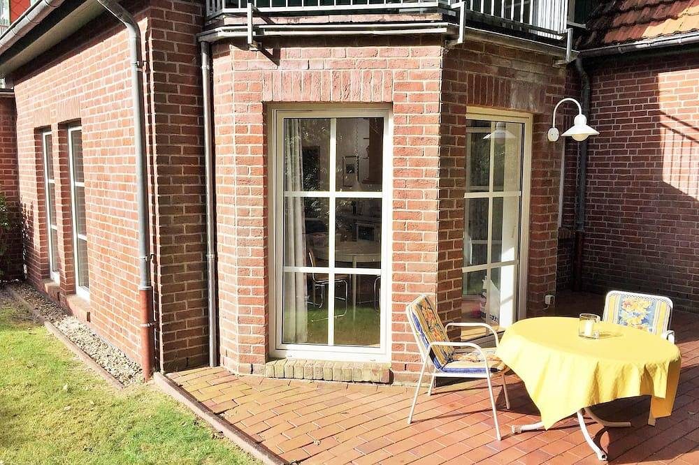Die gemütliche Ferienwohnung „Edes Huus“ liegt ruhig im Grünen am Langeooger Ort — Bild 2