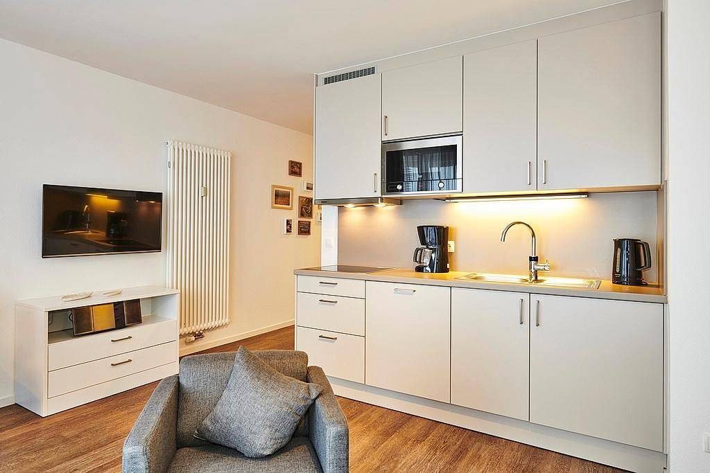 Strandnahes Ferienapartment mit großem Balkon inkl. Schwimmbad- & Saunanutzung — Bild 5
