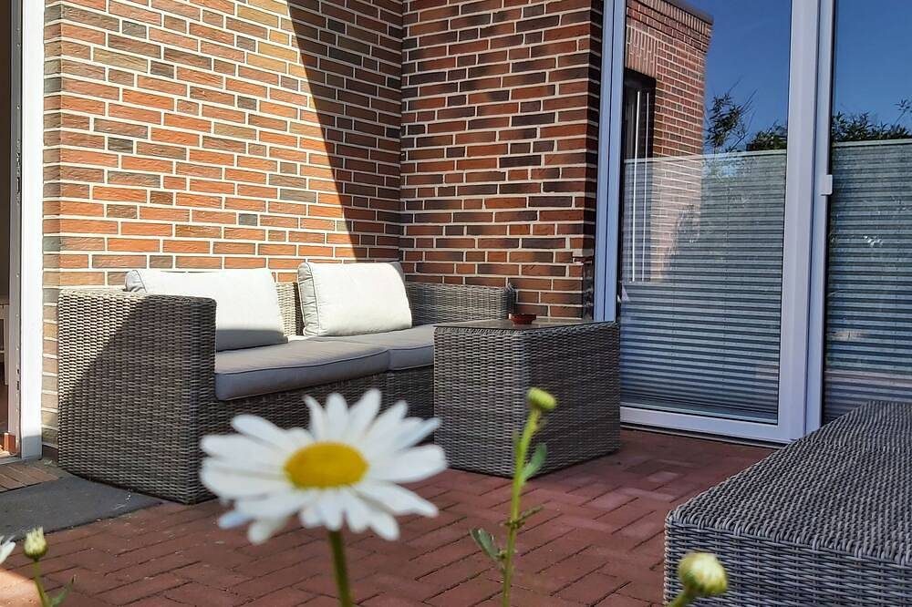 Moderne Ferienwohnung mit Südterrasse Nähe des Zentrums. — Bild 2