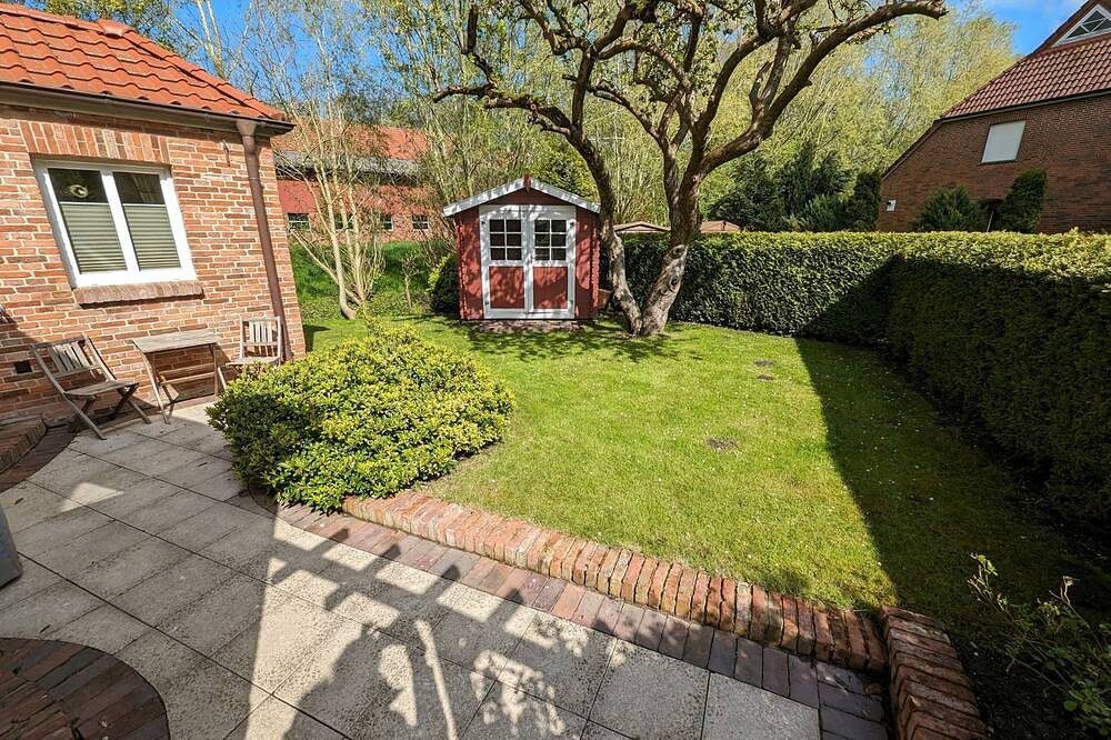 \"Dat Fischerhus – Idyllische Auszeit im Grünen mit Terrasse & Strandkorb!\" — Bild 2