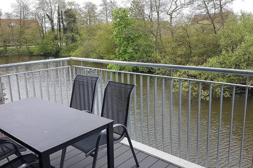 Apartment mit 2 Schlafzimmern, offener Küche, Wohnbereich und Wellnessbad. — Bild 3