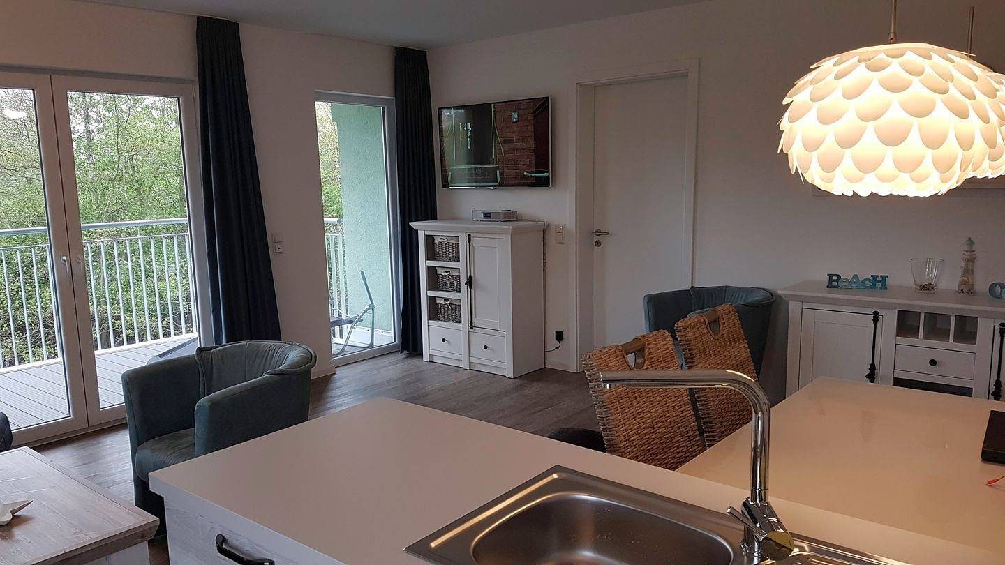 Apartment mit 2 Schlafzimmern, offener Küche, Wohnbereich und Wellnessbad. — Bild 2